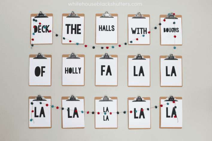 deck the walls with this DIY Christmas Carol art! Even shows how to make a clipboard wall.