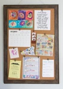 custom rustic bulletin board command center in a kids' room